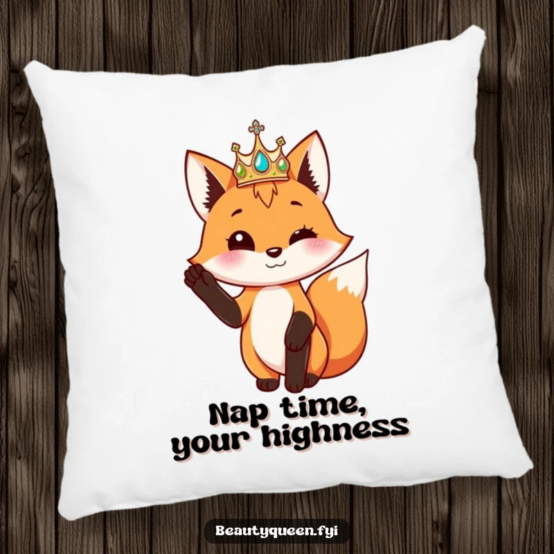 Funny fox with a shimmering crown poses elegantly with one paw raised, on a decorative pillow.
