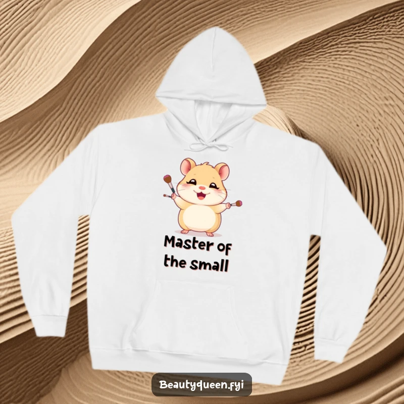 Funny hoodie depicting a smiling hamster skillfully juggling a collection of small makeup brushes, radiating confidence and charm.
